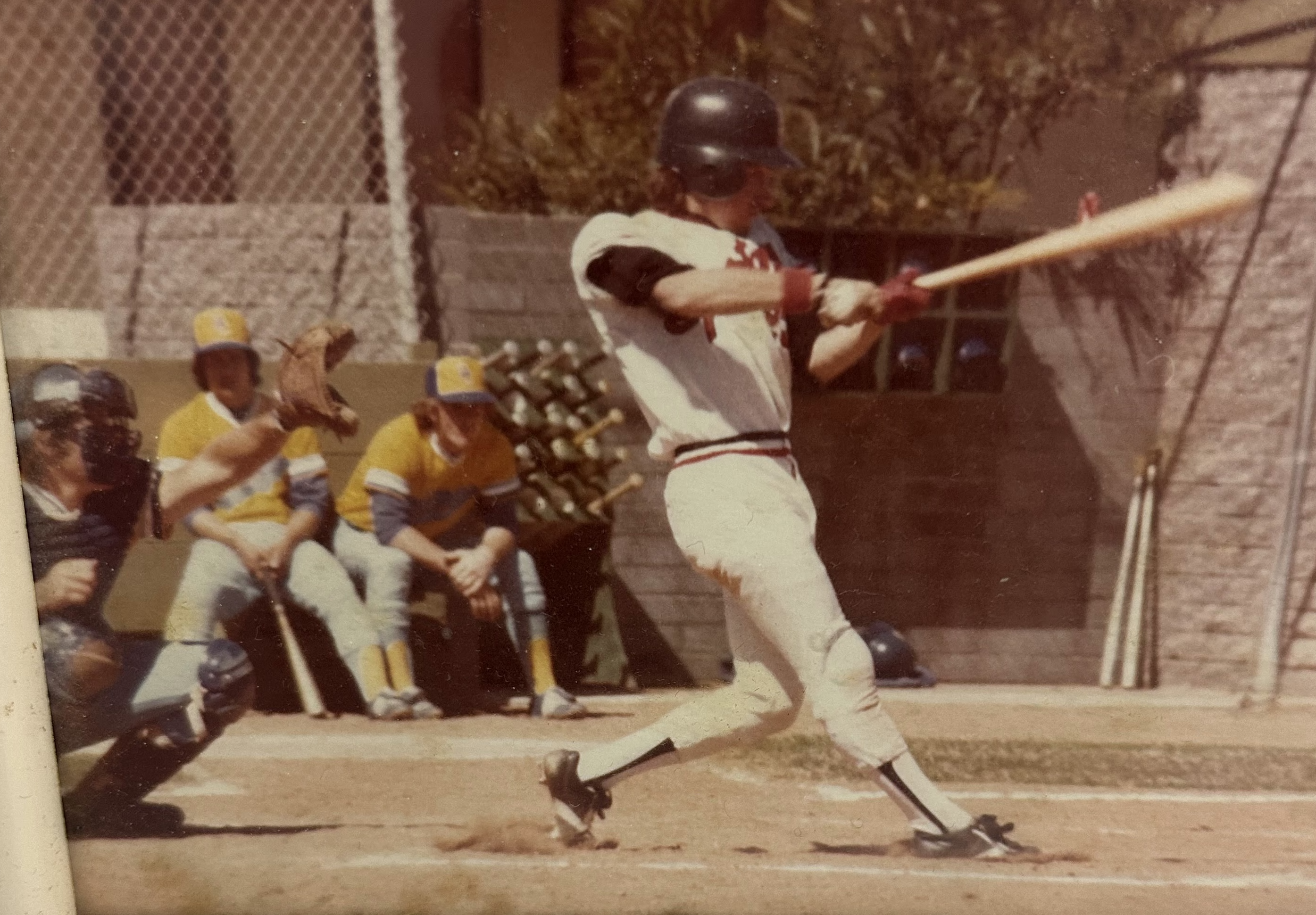 Benny Gallo driving a pitch during his professional playing career